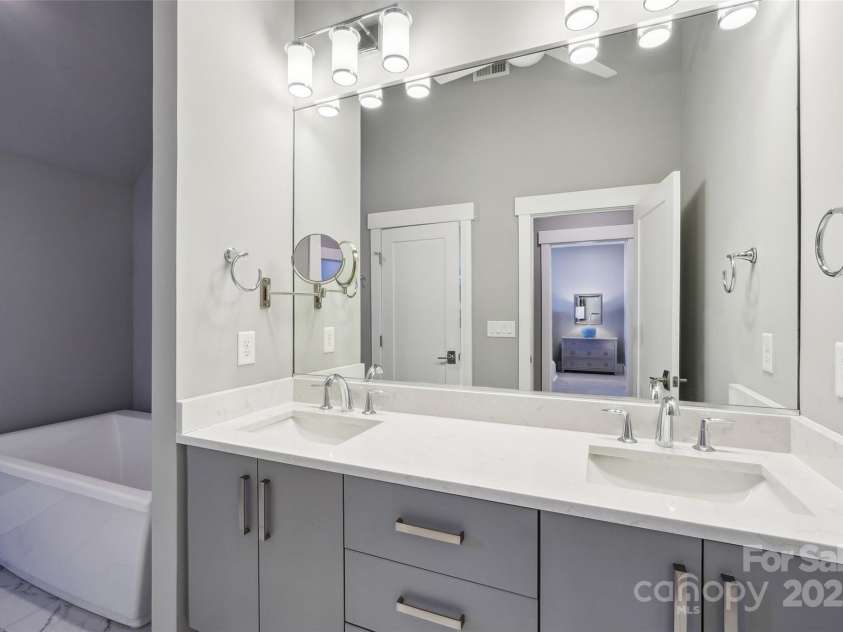 7908 Rea View Court, Charlotte, NC 28226.  MLS# CAR4257499, YatesRealty ID 12354. Upstairs Primary Bathroom dual vanities