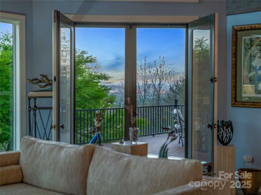 10 Beaverbrook Court, Asheville, NC 28804.  MLS# CAR4246277, YatesRealty ID 1236. Entrance to deck from Living Room