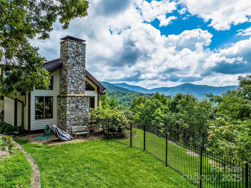 10 Beaverbrook Court, Asheville, NC 28804.  MLS# CAR4246277, YatesRealty ID 1236. Fence has sections between rear yard and whole complex.