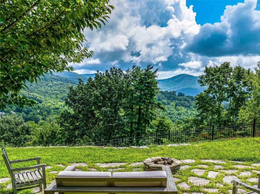 10 Beaverbrook Court, Asheville, NC 28804.  MLS# CAR4246277, YatesRealty ID 1236. Fire pit area with incredible views to the East to watch the moon rise and star gaze.