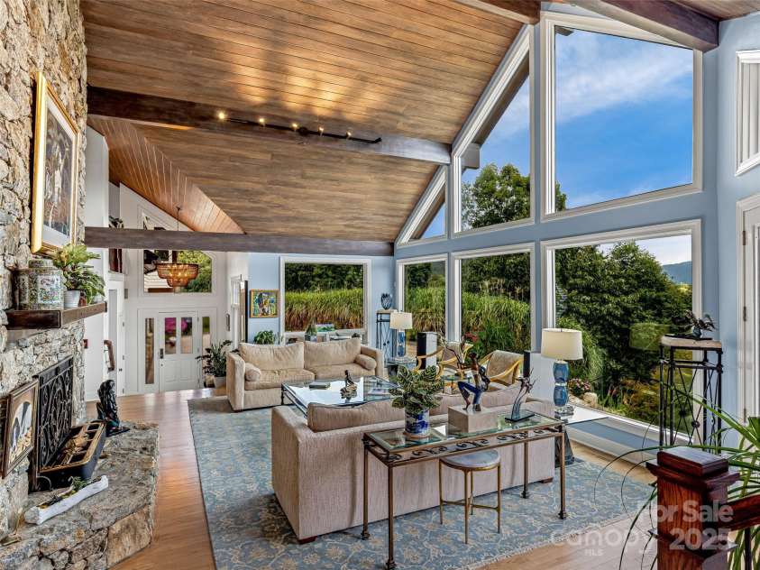 10 Beaverbrook Court, Asheville, NC 28804.  MLS# CAR4246277, YatesRealty ID 1236. The living room has Eastern Exposure so the home is bathed in natural listing. Also great for watching the Moon and Sun Rise over the mountains.