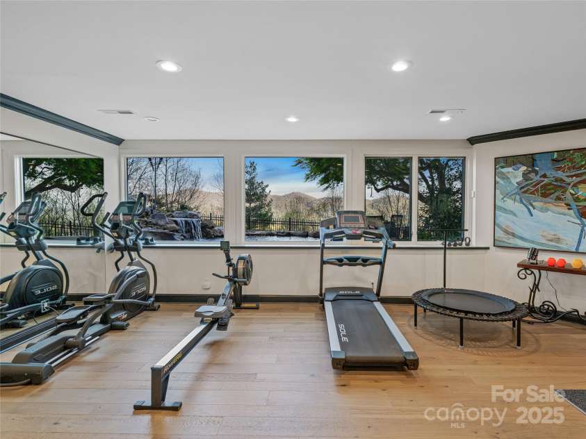 10 Beaverbrook Court, Asheville, NC 28804.  MLS# CAR4246277, YatesRealty ID 1236. Water feature and views from most rooms