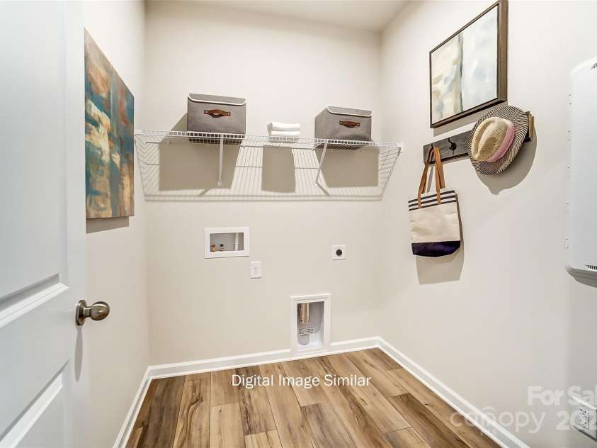 2517 Mabel Lane, Monroe, NC 28110.  MLS# CAR4257925, YatesRealty ID 12360. Main Level Laundry Room--Representational Photo Only