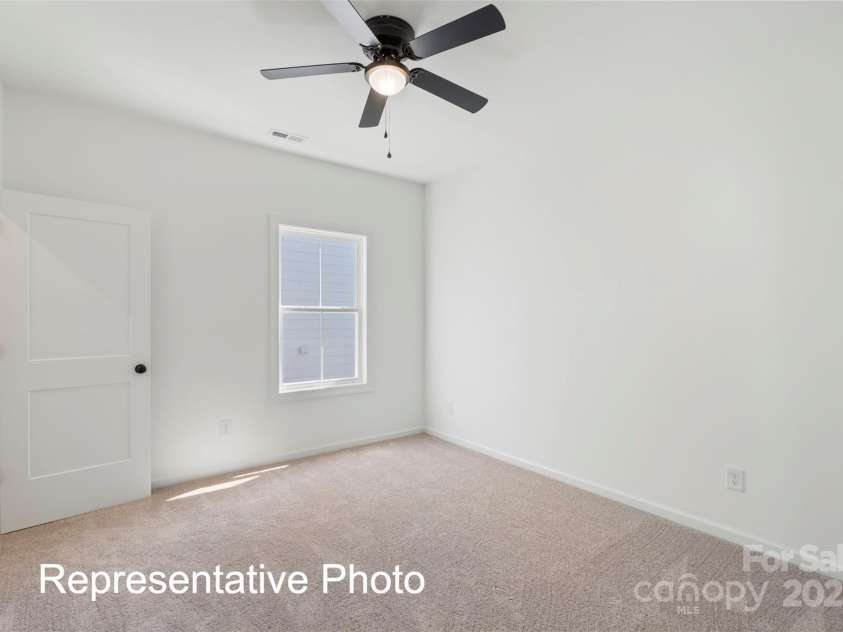 5820 Pittmon Lane, Kannapolis, NC 28081.  MLS# CAR4256365, YatesRealty ID 12365. Secondary Bedroom 1