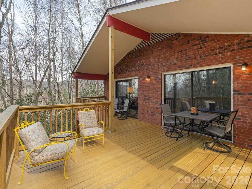 227 Sky Lake Drive, Hendersonville, NC 28739.  MLS# CAR4349370, YatesRealty ID 12368. Expansive Deck