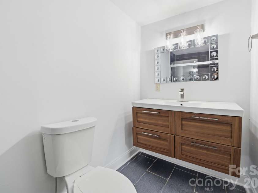 219 Breezewood Drive, Charlotte, NC 28262.  MLS# CAR4346086, YatesRealty ID 12375. En-suite bath