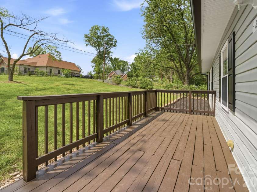 219 Breezewood Drive, Charlotte, NC 28262.  MLS# CAR4346086, YatesRealty ID 12375. Front Porch/deck