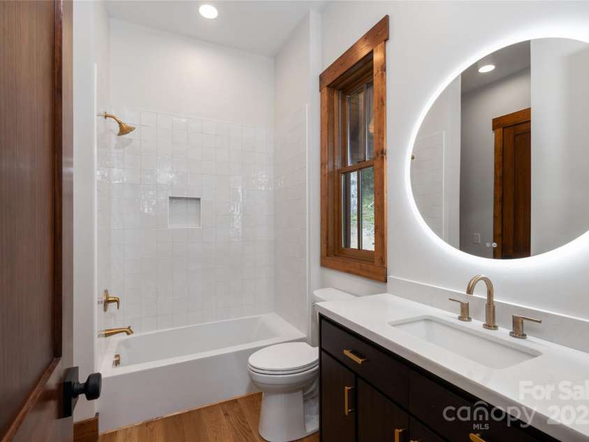 750 Silver Springs Drive, Banner Elk, NC 28604.  MLS# CAR4160928, YatesRealty ID 1238. Main floor secondary bedroom and full bathroom