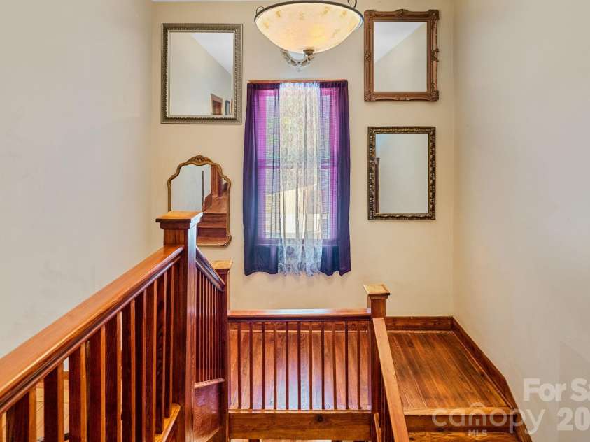 305 Ficker Circle, Hendersonville, NC 28739.  MLS# CAR4240043, YatesRealty ID 12380. Staircase to second floor