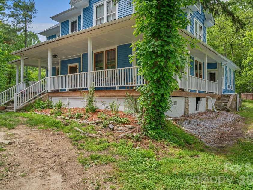 305 Ficker Circle, Hendersonville, NC 28739.  MLS# CAR4240043, YatesRealty ID 12380. Wraparound porch
