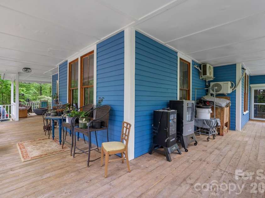 305 Ficker Circle, Hendersonville, NC 28739.  MLS# CAR4240043, YatesRealty ID 12380. Wraparound porch