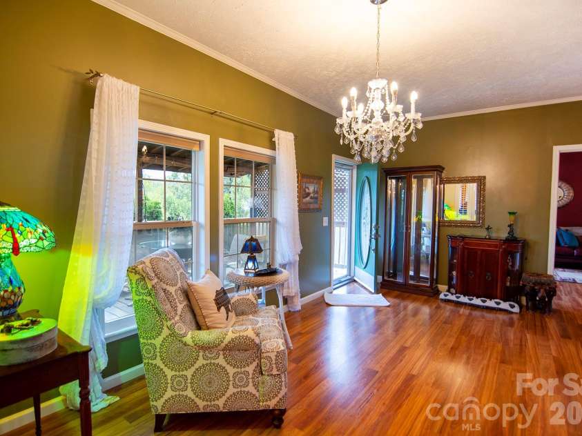 304 Golden Aster Road, Swannanoa, NC 28778.  MLS# CAR4304564, YatesRealty ID 12381. Entrance and sitting area