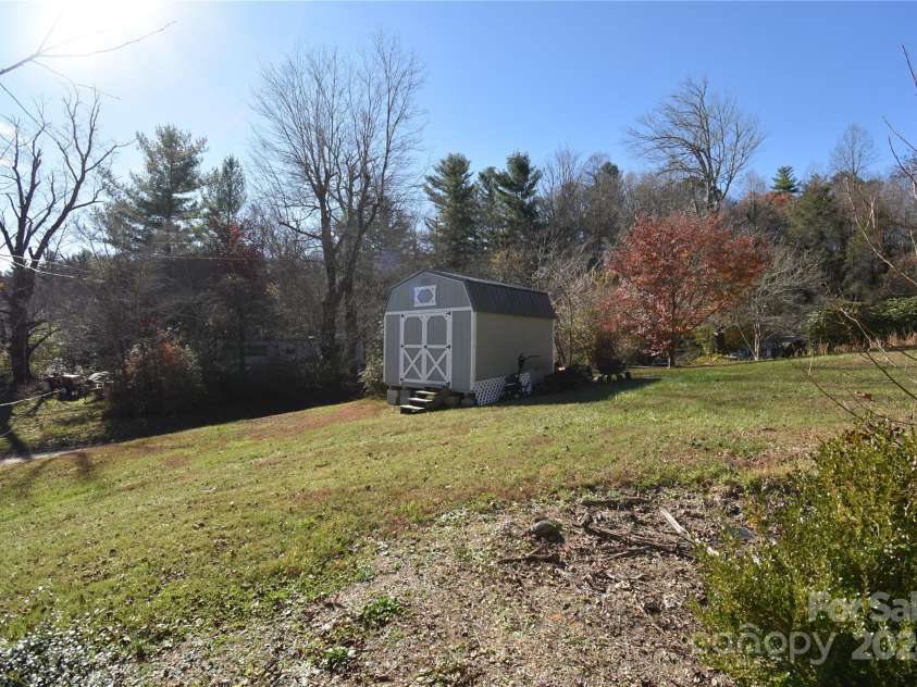 549 Freeman Creek Road, Zirconia, NC 28790.  MLS# CAR4203056, YatesRealty ID 12382. 
