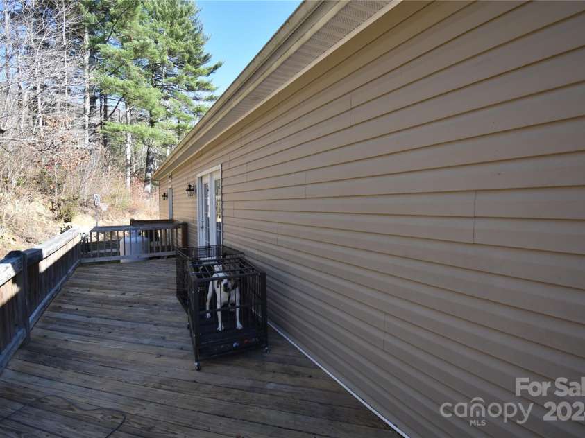 549 Freeman Creek Road, Zirconia, NC 28790.  MLS# CAR4203056, YatesRealty ID 12382. Back deck