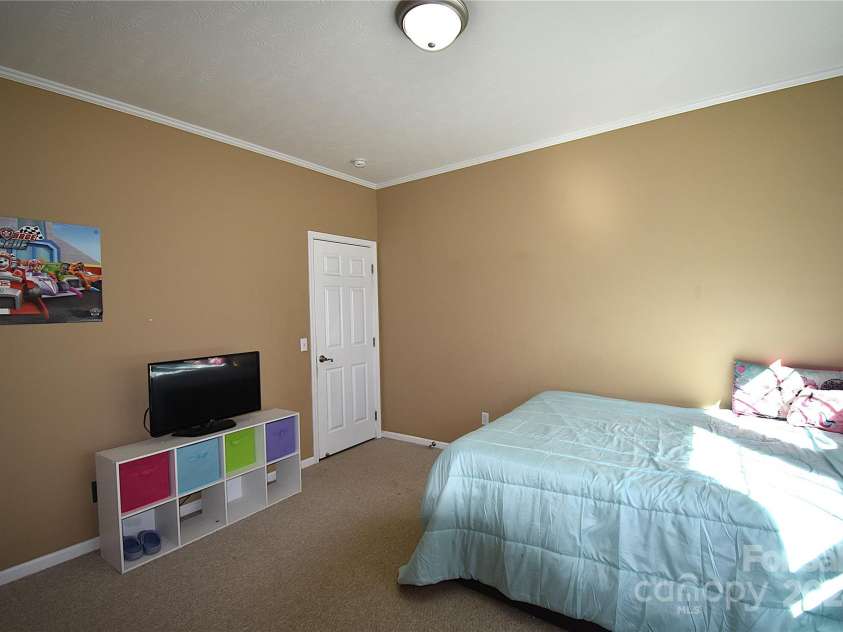 549 Freeman Creek Road, Zirconia, NC 28790.  MLS# CAR4203056, YatesRealty ID 12382. Bedroom w