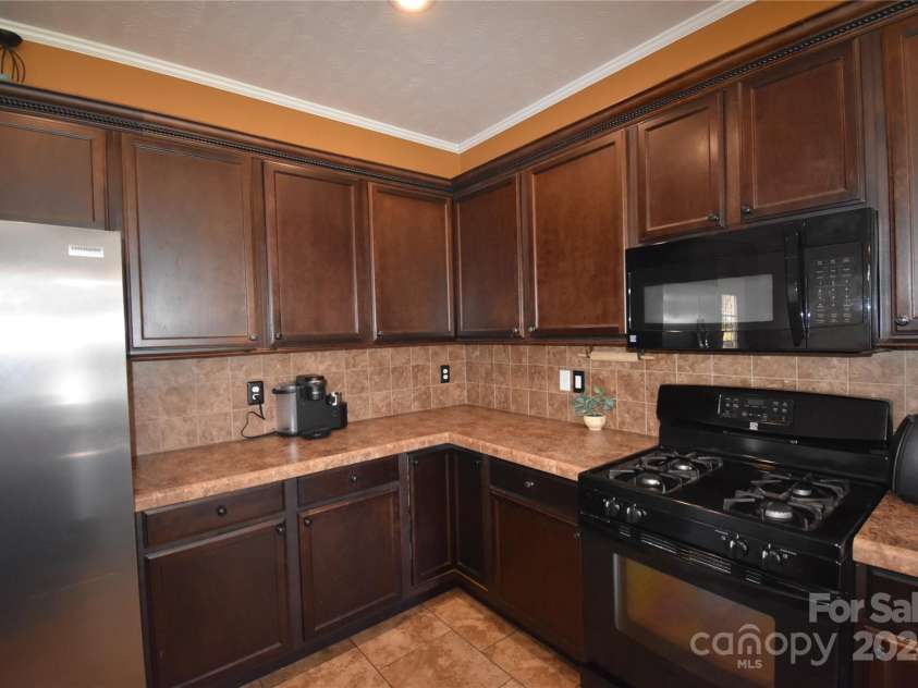 549 Freeman Creek Road, Zirconia, NC 28790.  MLS# CAR4203056, YatesRealty ID 12382. Gas range/oven