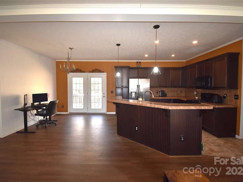 549 Freeman Creek Road, Zirconia, NC 28790.  MLS# CAR4203056, YatesRealty ID 12382. Kitchen and dining