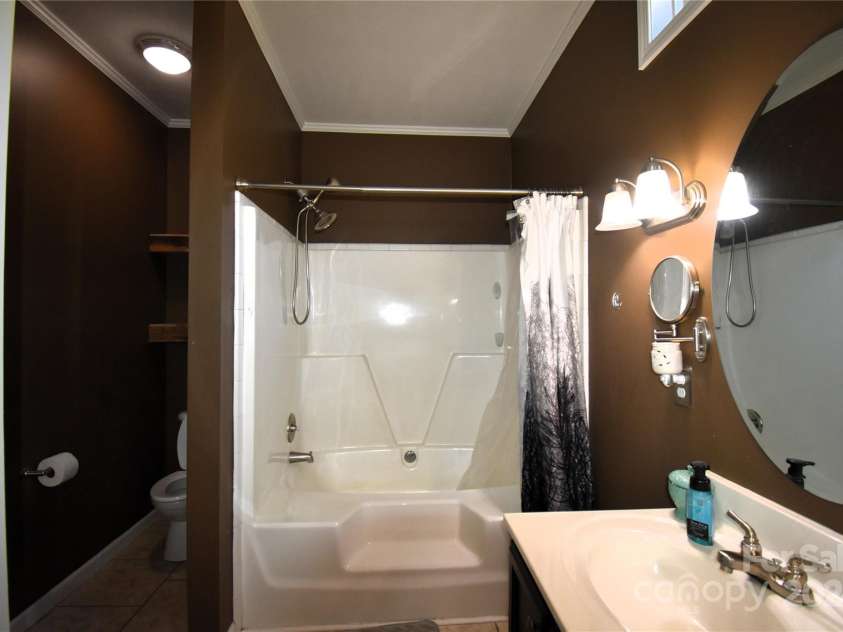 549 Freeman Creek Road, Zirconia, NC 28790.  MLS# CAR4203056, YatesRealty ID 12382. Primary Bath