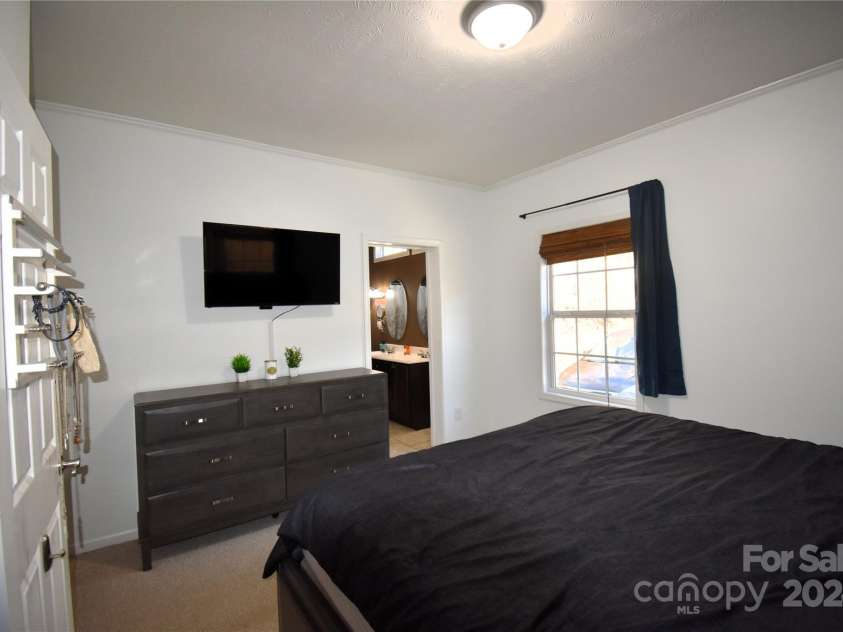 549 Freeman Creek Road, Zirconia, NC 28790.  MLS# CAR4203056, YatesRealty ID 12382. Primary Suite