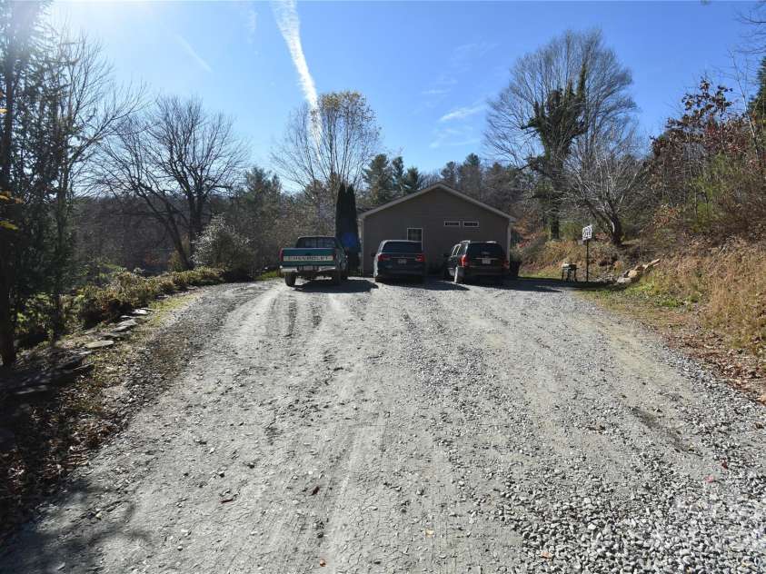549 Freeman Creek Road, Zirconia, NC 28790.  MLS# CAR4203056, YatesRealty ID 12382. Spacious driveway for plenty of parking