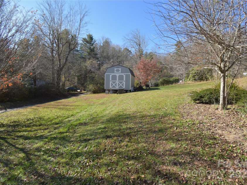 549 Freeman Creek Road, Zirconia, NC 28790.  MLS# CAR4203056, YatesRealty ID 12382. Storage shed