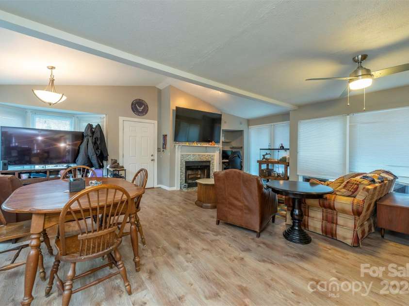 842 Mountain View Church Road, Zirconia, NC 28790.  MLS# CAR4205942, YatesRealty ID 12383. Living room/dining room