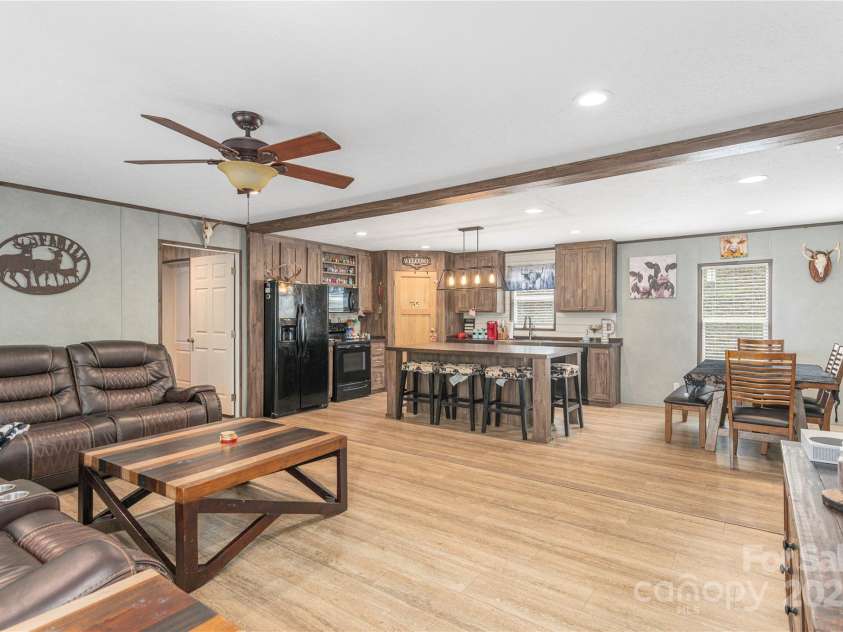 87 Horseback Lane, Marshall, NC 28753.  MLS# CAR4251023, YatesRealty ID 12384. Open Concept Living to Kitchen and Dining.