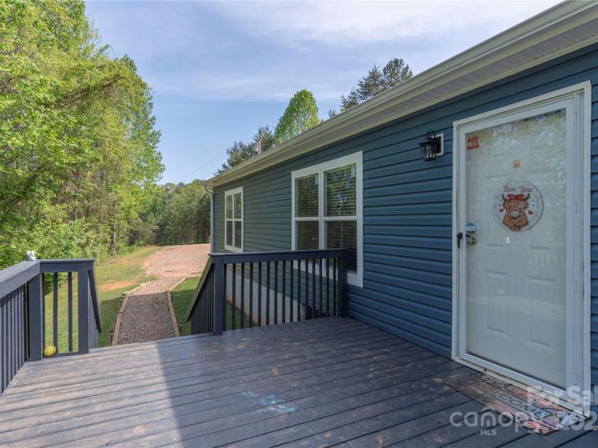 87 Horseback Lane, Marshall, NC 28753.  MLS# CAR4251023, YatesRealty ID 12384. Spacious Front Deck