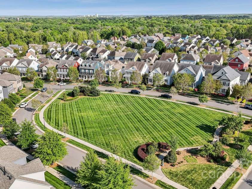 2311 Lochview Street, Pineville, NC 28134.  MLS# CAR4246576, YatesRealty ID 12385. Delightful Green Space (front of the home)