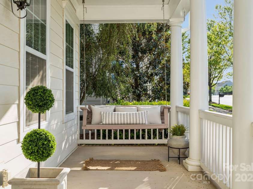 2311 Lochview Street, Pineville, NC 28134.  MLS# CAR4246576, YatesRealty ID 12385. Front Porch Swing