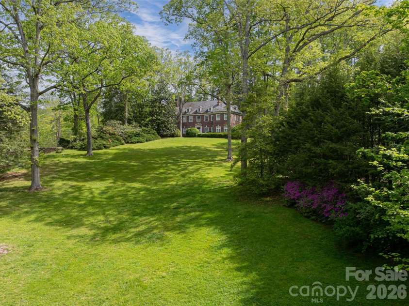 407 Vanderbilt Road, Asheville, NC 28803.  MLS# CAR4363302, YatesRealty ID 12385. Situated on Over Four Acres