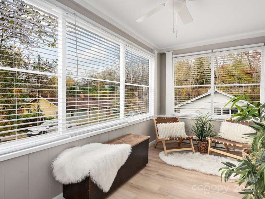 60 Fulton Street, Asheville, NC 28801.  MLS# CAR4196168, YatesRealty ID 12392. Heated sun room for year-round extended living space.
