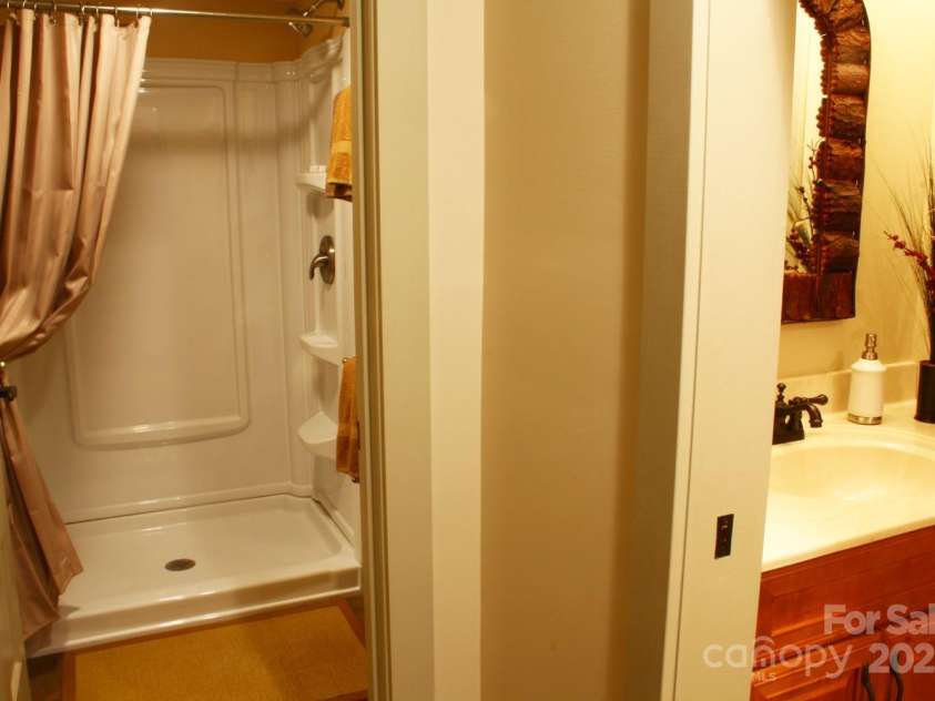 178 Whetstone Gap Road, Lake Toxaway, NC 28747.  MLS# CAR4229109, YatesRealty ID 12394. Guest bathroom