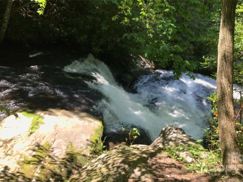 178 Whetstone Gap Road, Lake Toxaway, NC 28747.  MLS# CAR4229109, YatesRealty ID 12394. Hiking to a local waterfall