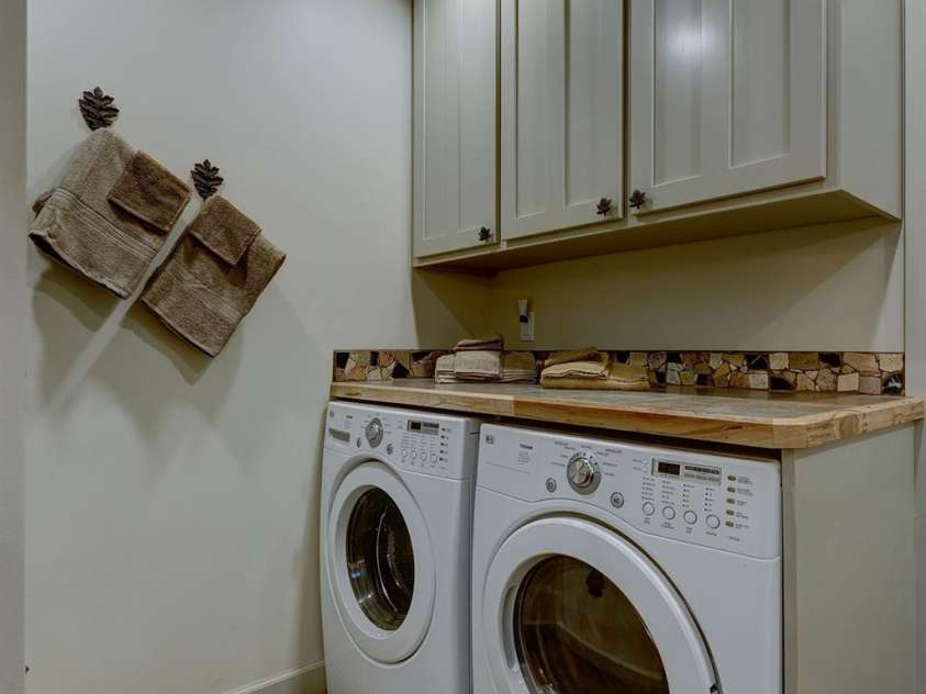 178 Whetstone Gap Road, Lake Toxaway, NC 28747.  MLS# CAR4229109, YatesRealty ID 12394. Laundry in master bathroom