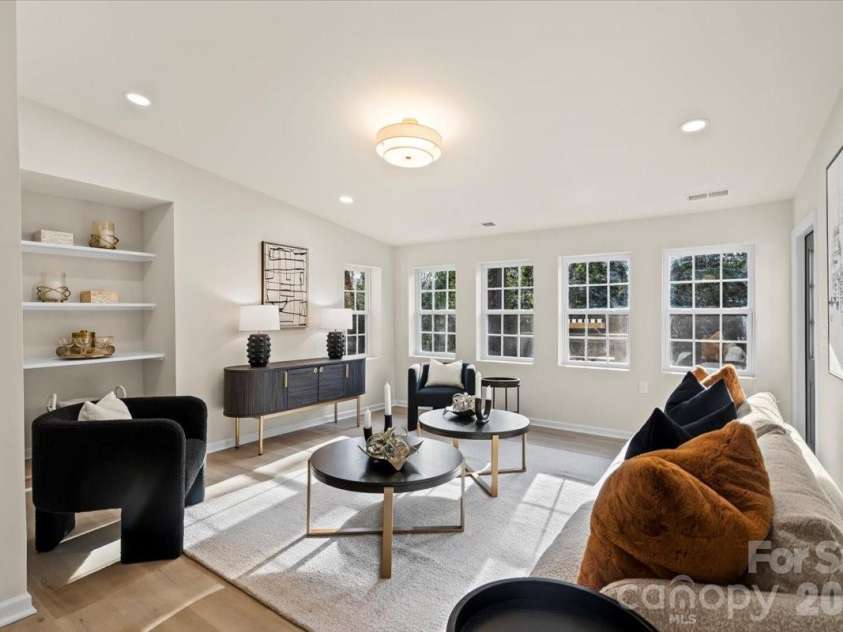 6900 Valley Haven Drive, Charlotte, NC 28211.  MLS# CAR4346108, YatesRealty ID 12397. Large den with built-ins off the living room/kitchen