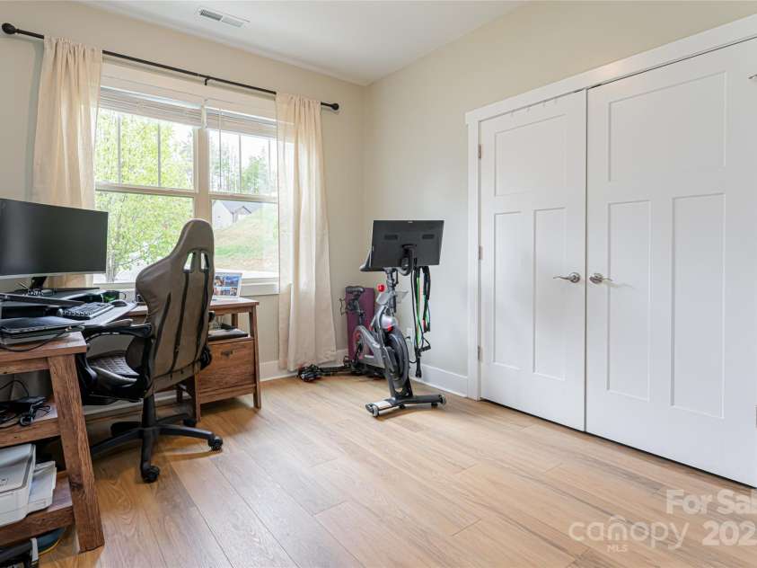 316 Wild Ginger Court, Weaverville, NC 28787.  MLS# CAR4245855, YatesRealty ID 12406. Guest bedroom on main level
