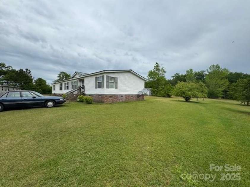 197 Cason Mclaurin Road, Morven, NC 28119.  MLS# CAR4255203, YatesRealty ID 12414. 