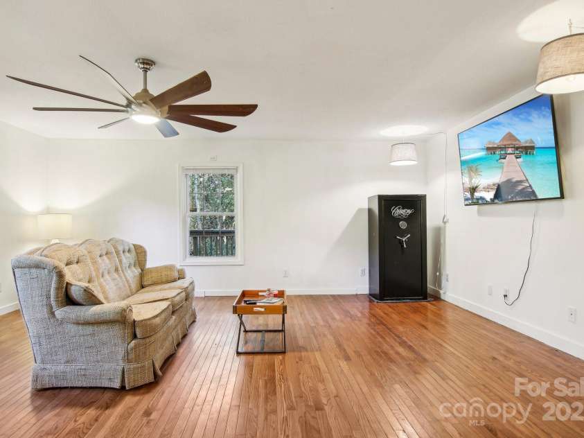 105 Big Bear Drive, Pisgah Forest, NC 28768.  MLS# CAR4192035, YatesRealty ID 12415. Spacious living room