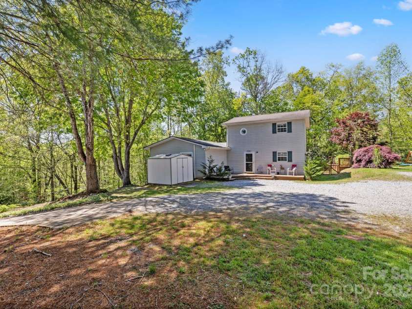 105 Big Bear Drive, Pisgah Forest, NC 28768.  MLS# CAR4192035, YatesRealty ID 12415. Welcome to 105 Big Bear Drive -- Plenty of parking and useable green space on this 0.87 acre lot!