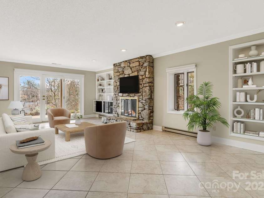 16 Ridgeview Drive, Asheville, NC 28804.  MLS# CAR4245815, YatesRealty ID 12417. Lower Living Room