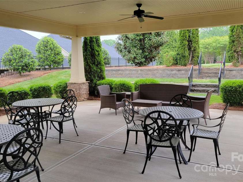 121 Martingale Avenue, Mooresville, NC 28115.  MLS# CAR4250401, YatesRealty ID 12419. Outdoor dining at clubhouse