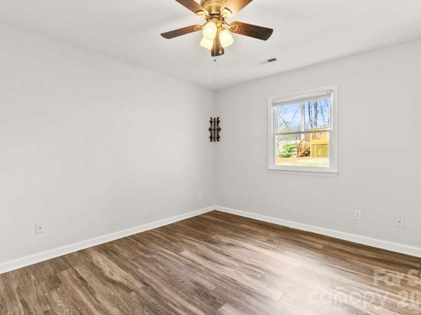 6041 Crape Myrtle Lane, Charlotte, NC 28216.  MLS# CAR4354736, YatesRealty ID 12425. Ceiling fan in primary