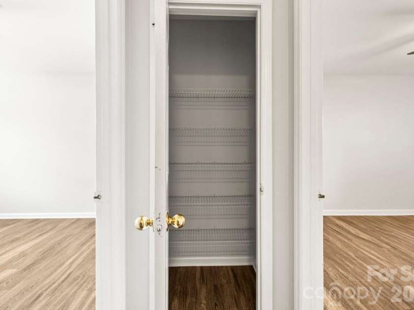 6041 Crape Myrtle Lane, Charlotte, NC 28216.  MLS# CAR4354736, YatesRealty ID 12425. Centrally located linen closet