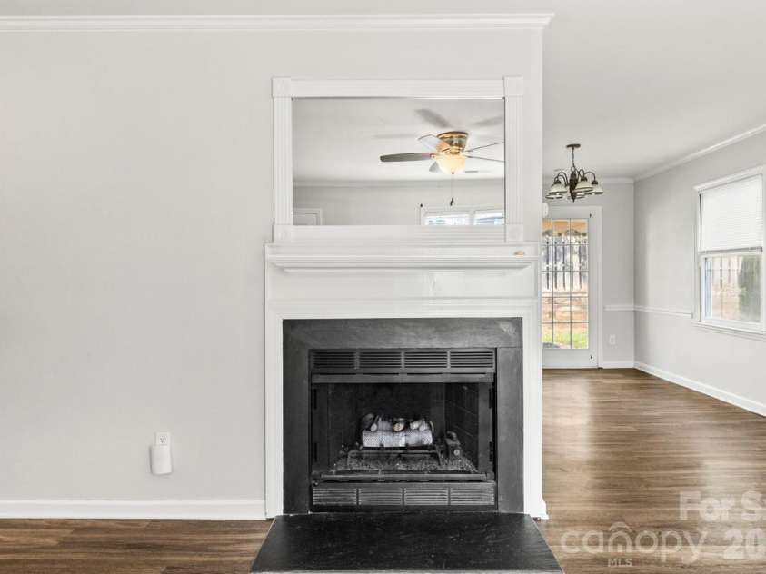 6041 Crape Myrtle Lane, Charlotte, NC 28216.  MLS# CAR4354736, YatesRealty ID 12425. Gas fireplace