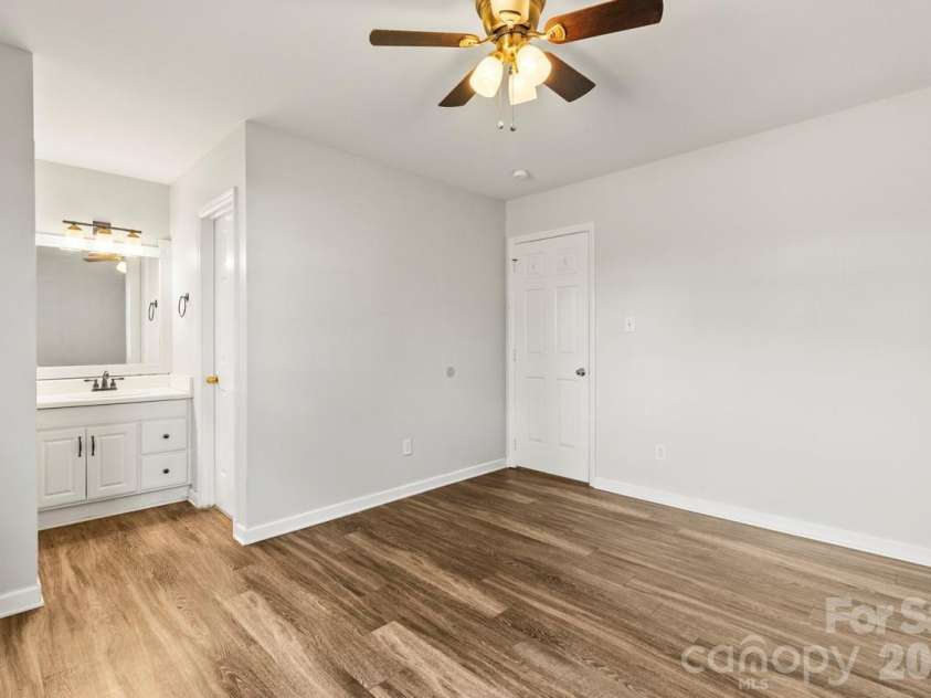 6041 Crape Myrtle Lane, Charlotte, NC 28216.  MLS# CAR4354736, YatesRealty ID 12425. Primary Bedroom