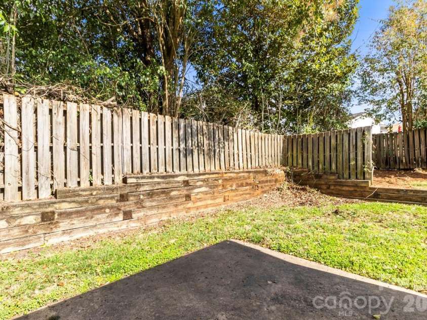 6041 Crape Myrtle Lane, Charlotte, NC 28216.  MLS# CAR4354736, YatesRealty ID 12425. Surprisingly private 