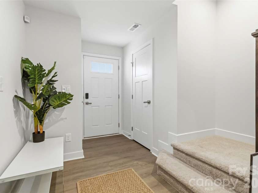 3149 Beeler Lane, Charlotte, NC 28208.  MLS# CAR4352531, YatesRealty ID 12426. Facing the Front Door