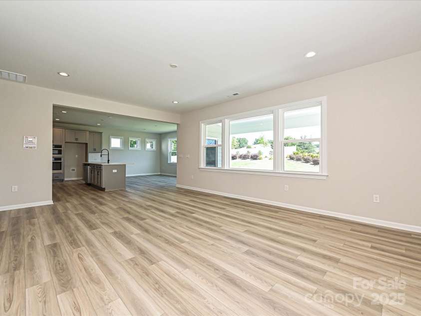 2046 Sabra Street, Gastonia, NC 28054.  MLS# CAR4257954, YatesRealty ID 12427. Family Room/Kitchen/Breakfast