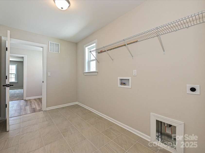 2046 Sabra Street, Gastonia, NC 28054.  MLS# CAR4257954, YatesRealty ID 12427. Laundry Room